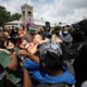 People fight over a confederate flag in Stone Mountain Park, Ga.